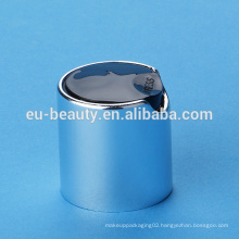 disc top caps for cosmetic packaging